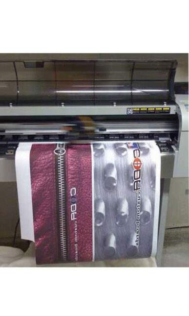 A poster getting printed and laminated